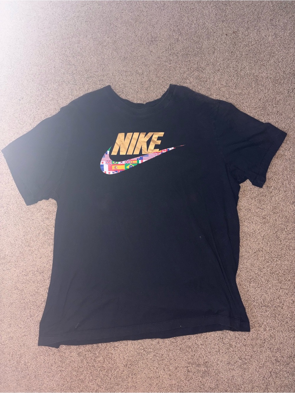Nike Black T-Shirt with Gold Logo and Multicolor Swoosh